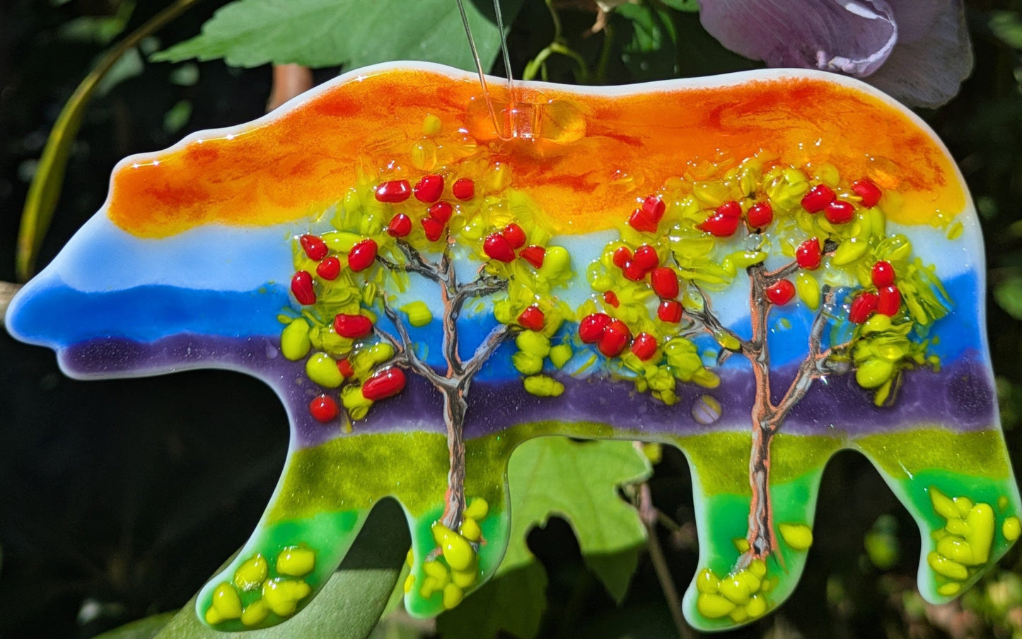 mountain bear with apple trees